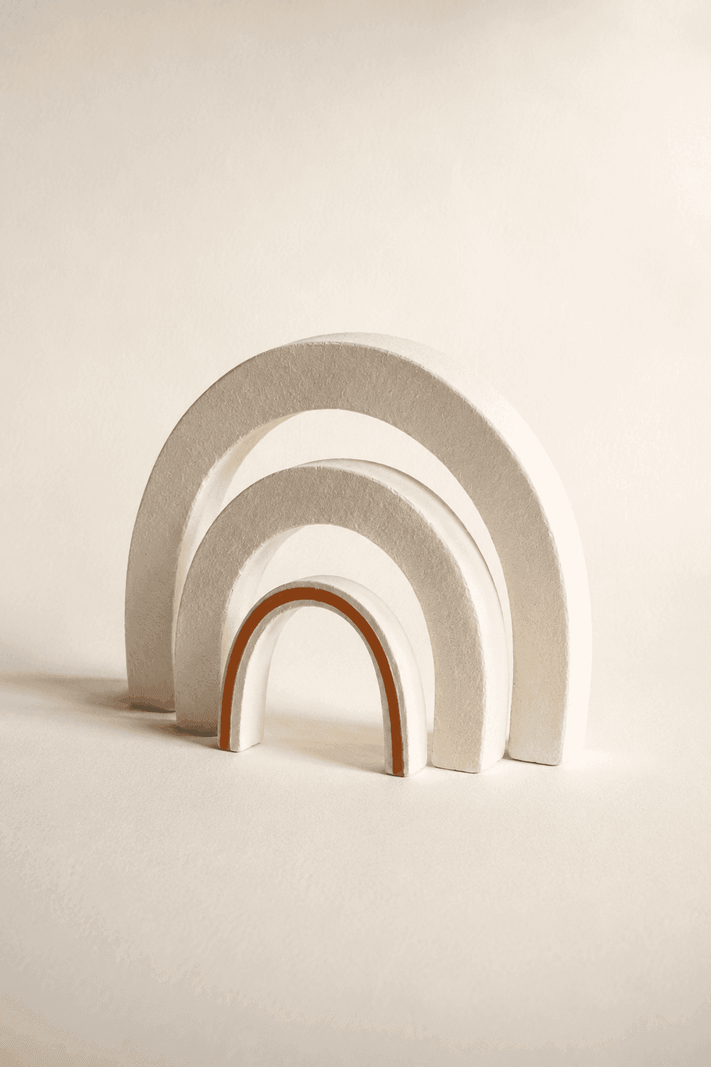 Nested plaster arcs suggesting a voice radiating outward
